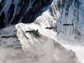 A 10 Thunderbolt IIs fly over the Pacific Alaska