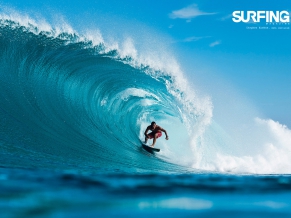 Surfing in Teahupoo Tahiti