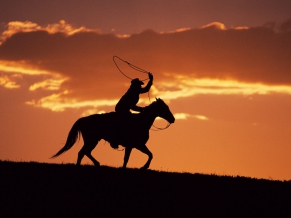 Western Cowboy at Sunset