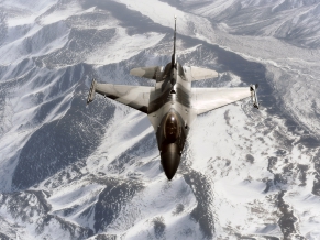 F 16 Aggressor Over the Joint Pacific Alaskan Range