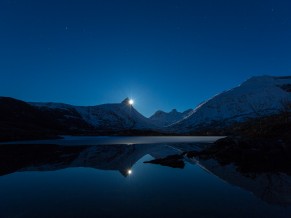 Moon Behind Mountain Reflection